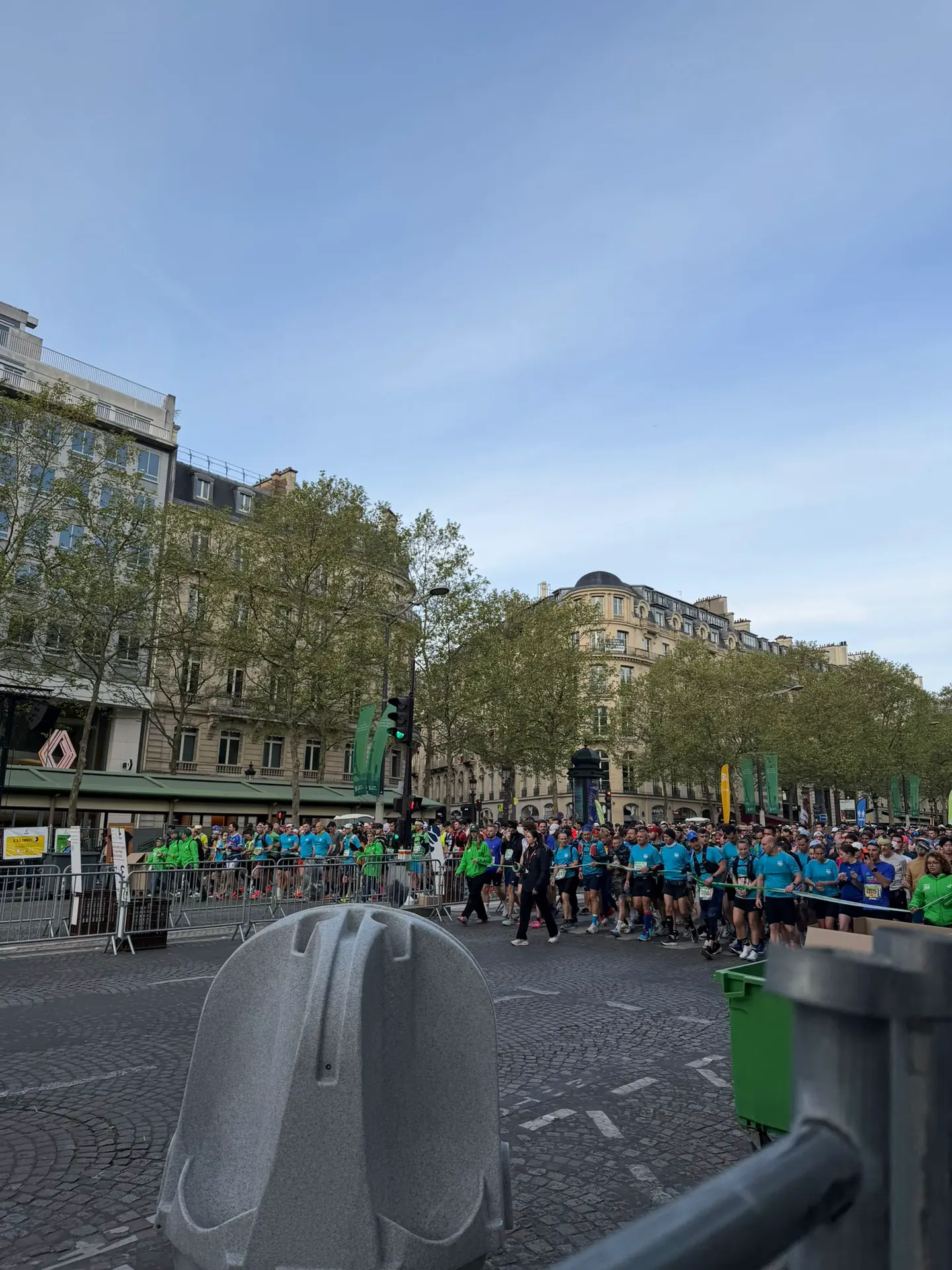 Huge crowd of runners packed at the start line of the Paris Marathon with Hardest Adventures.