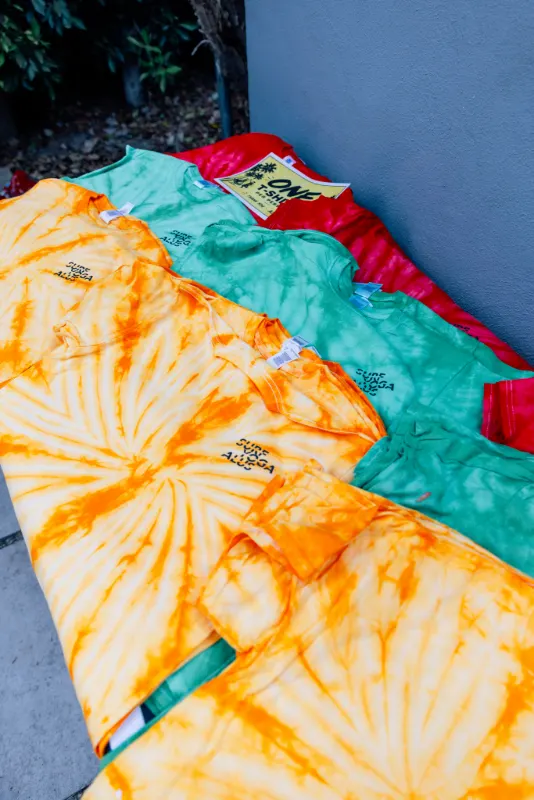 The SYB x LT Days tie-dye shirts laid out at Milwood Studios before the run