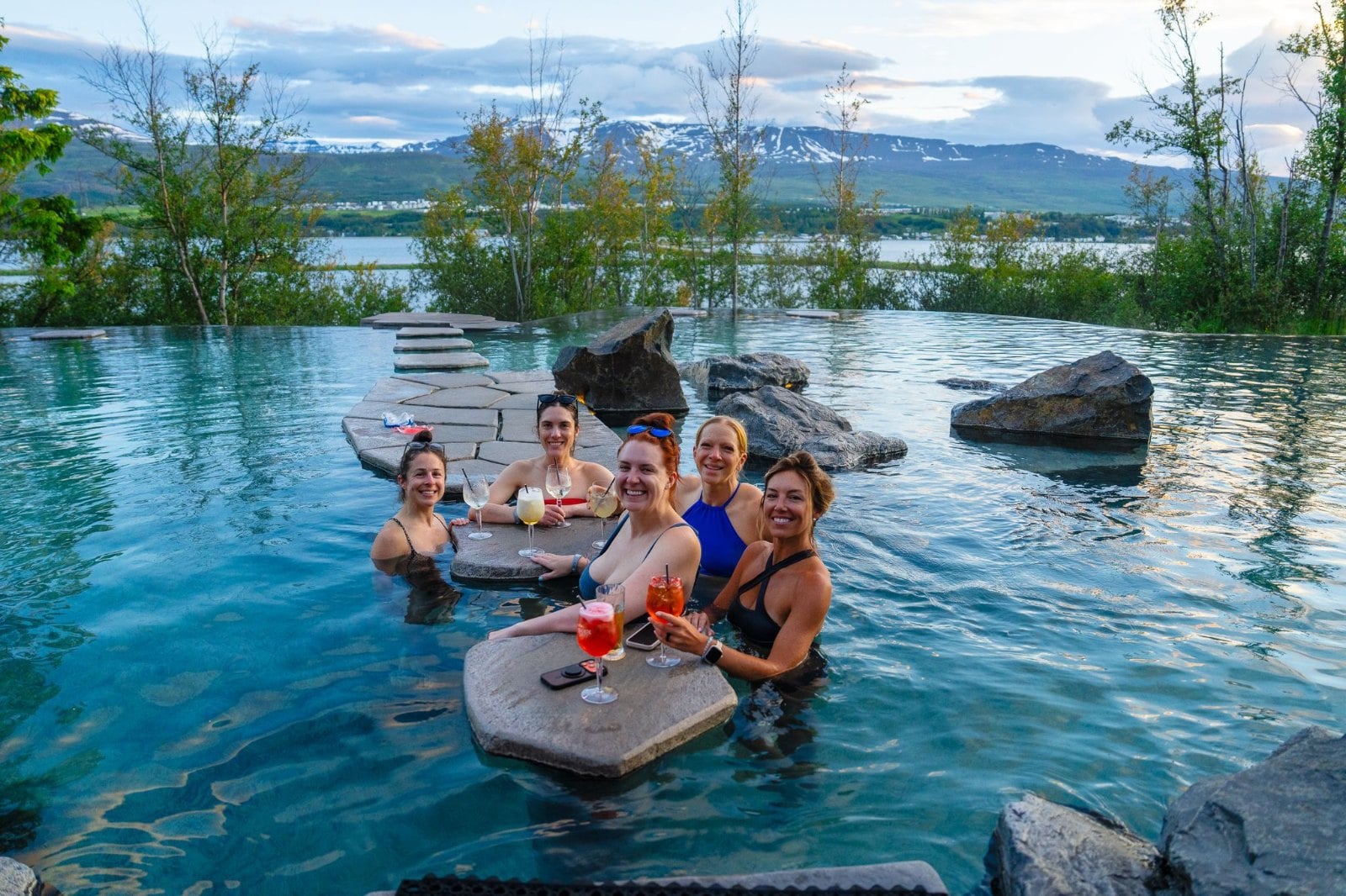 The SurfYogaBeer crew soaking at the Forest Lagoon near Akureyri