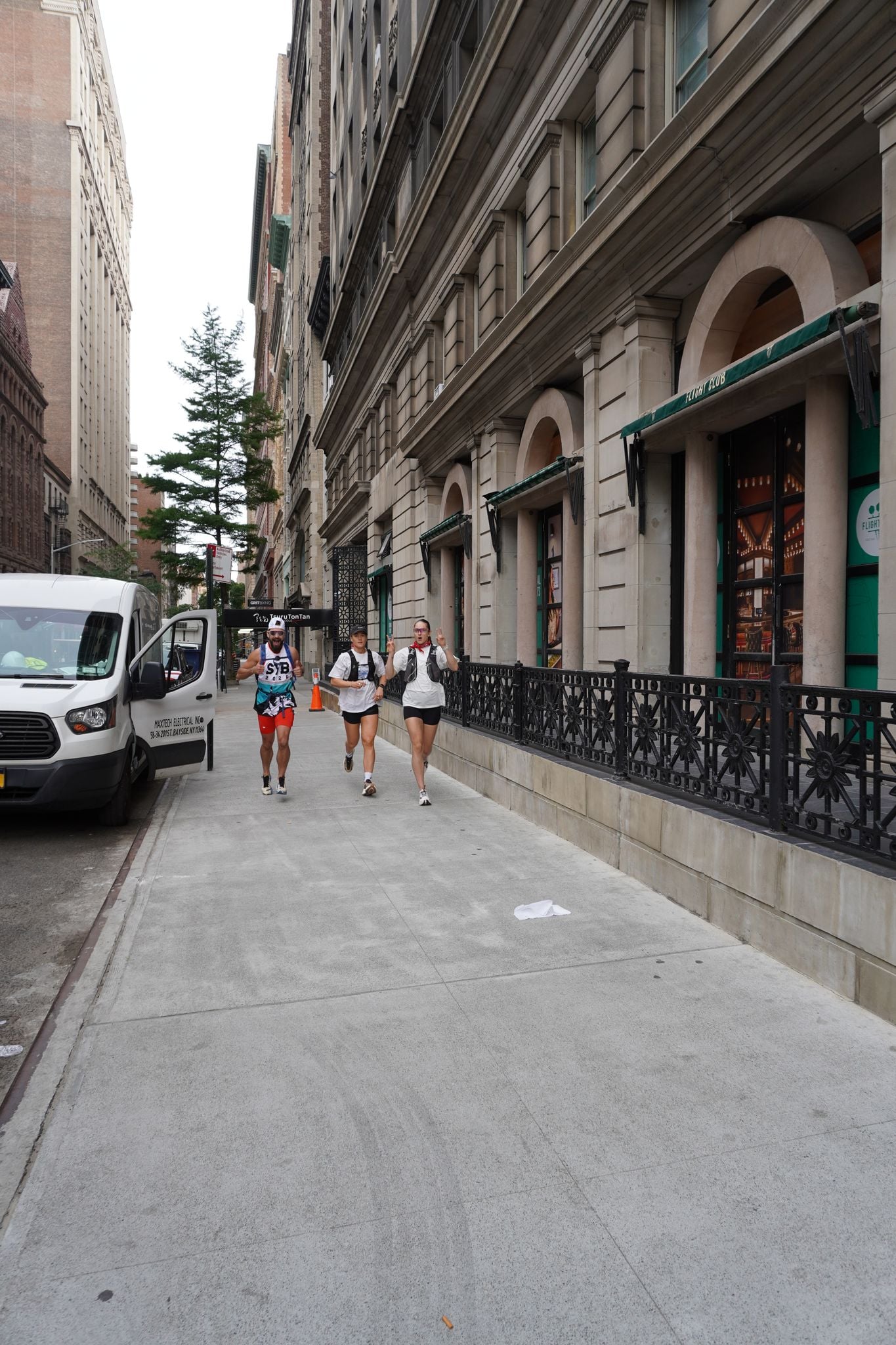 SurfYogaBeer runners on a Manhattan street