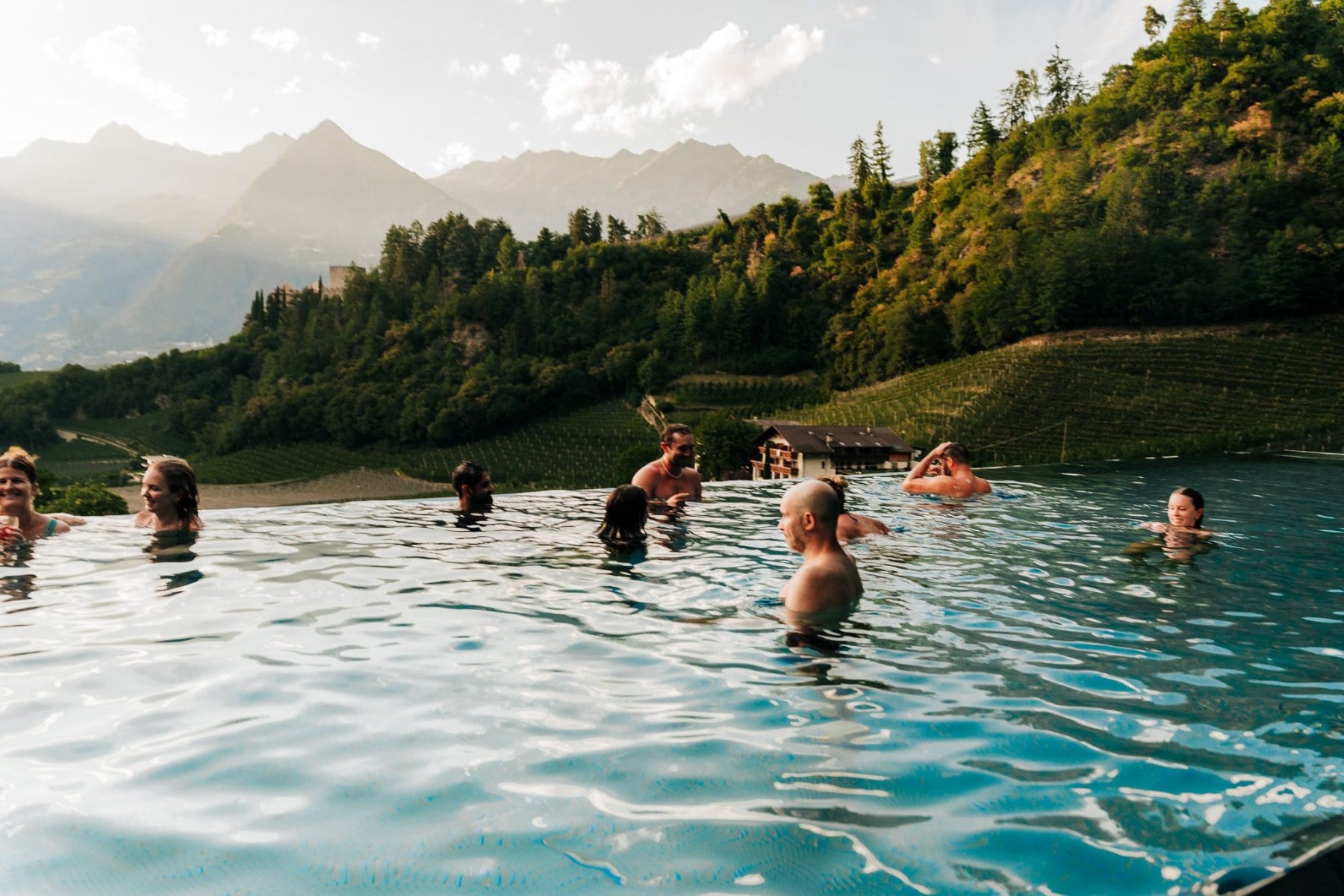 The SurfYogaBeer crew in the Prinz Rudolf infinity pool above Merano