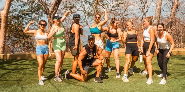 Crew flexing after a lawn workout