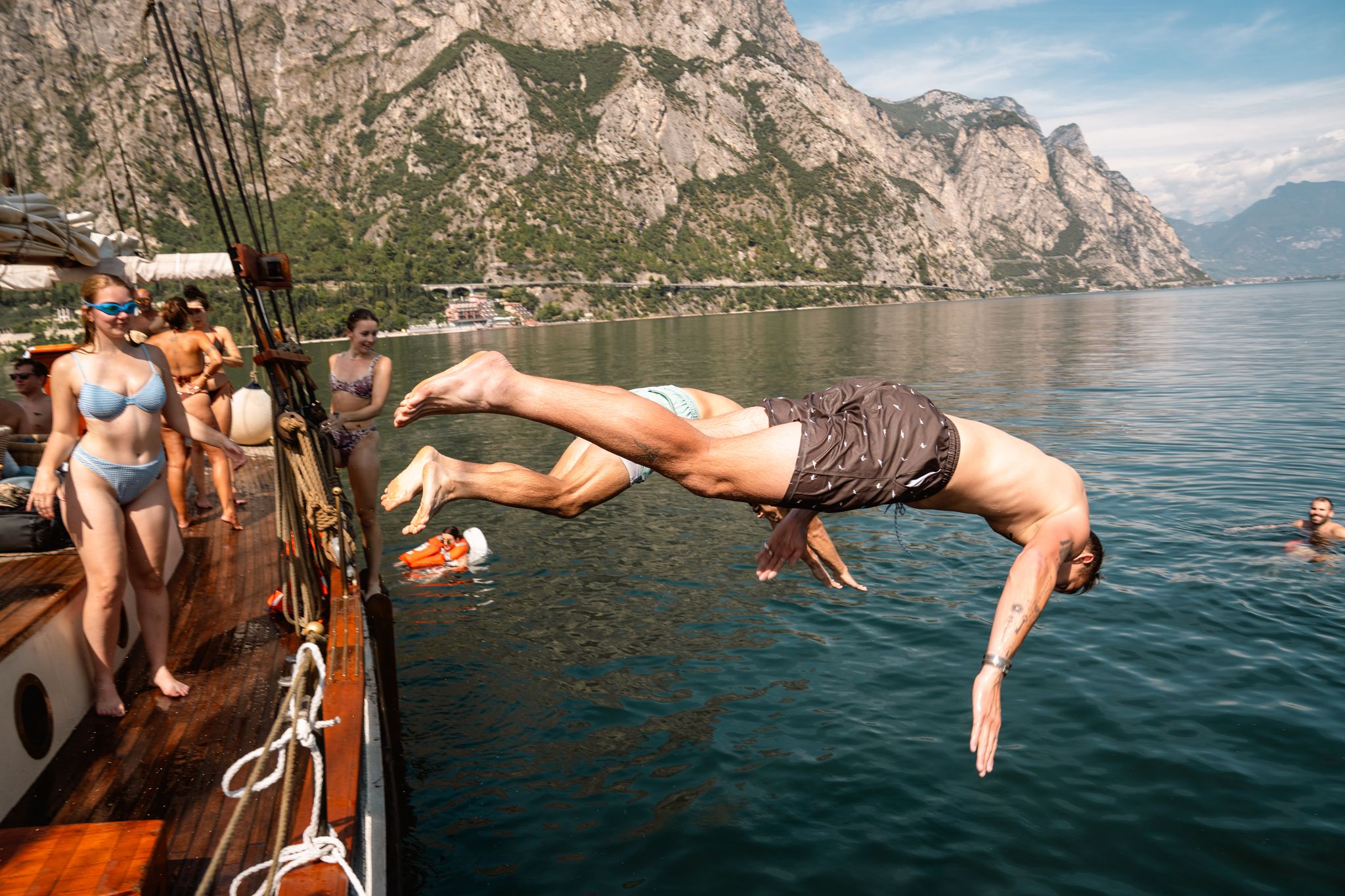 Diving off the boat into Lake Garda
