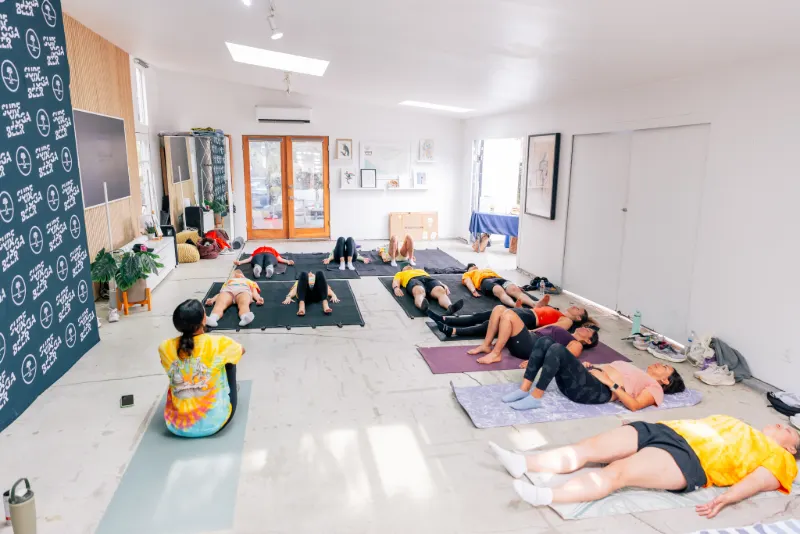 The whole studio on the mats for the Pilates flow at Milwood Studios