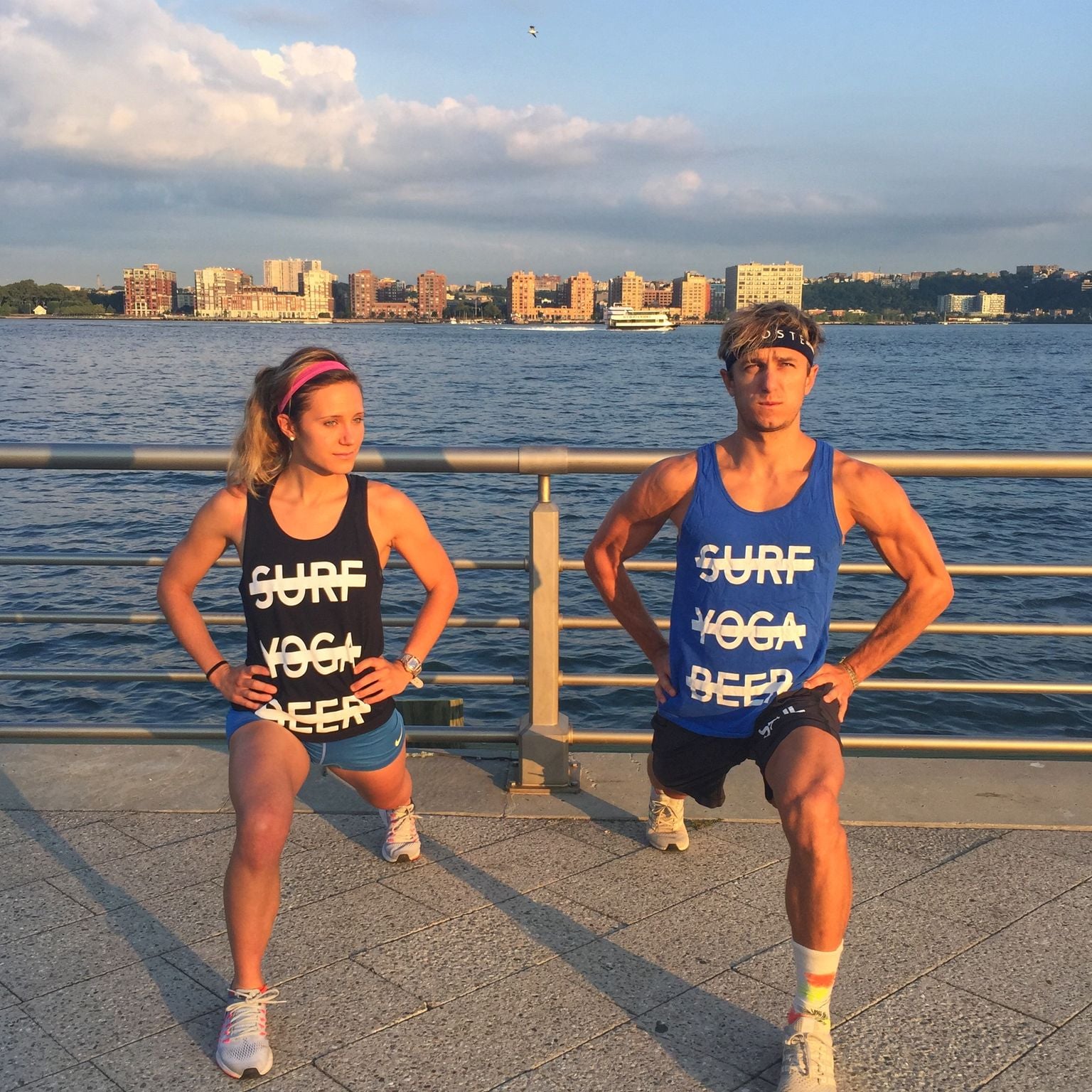 Two runners in SurfYogaBeer tanks