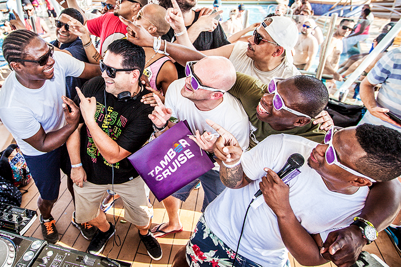 A group of diverse men attending a house music cruise on a cruiseship