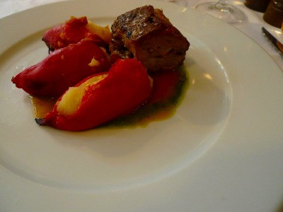 Suckling Pyrenees lamb with stuffed peppers at Le Timbre, in the 6th Arrondissement, in Paris.