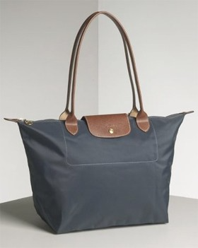 Longchamp’s Le Pliage folding tote, launched in 1993, is an absolute must-have for travel.