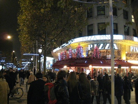The lights at Pizza Pino on the Champs Elysées