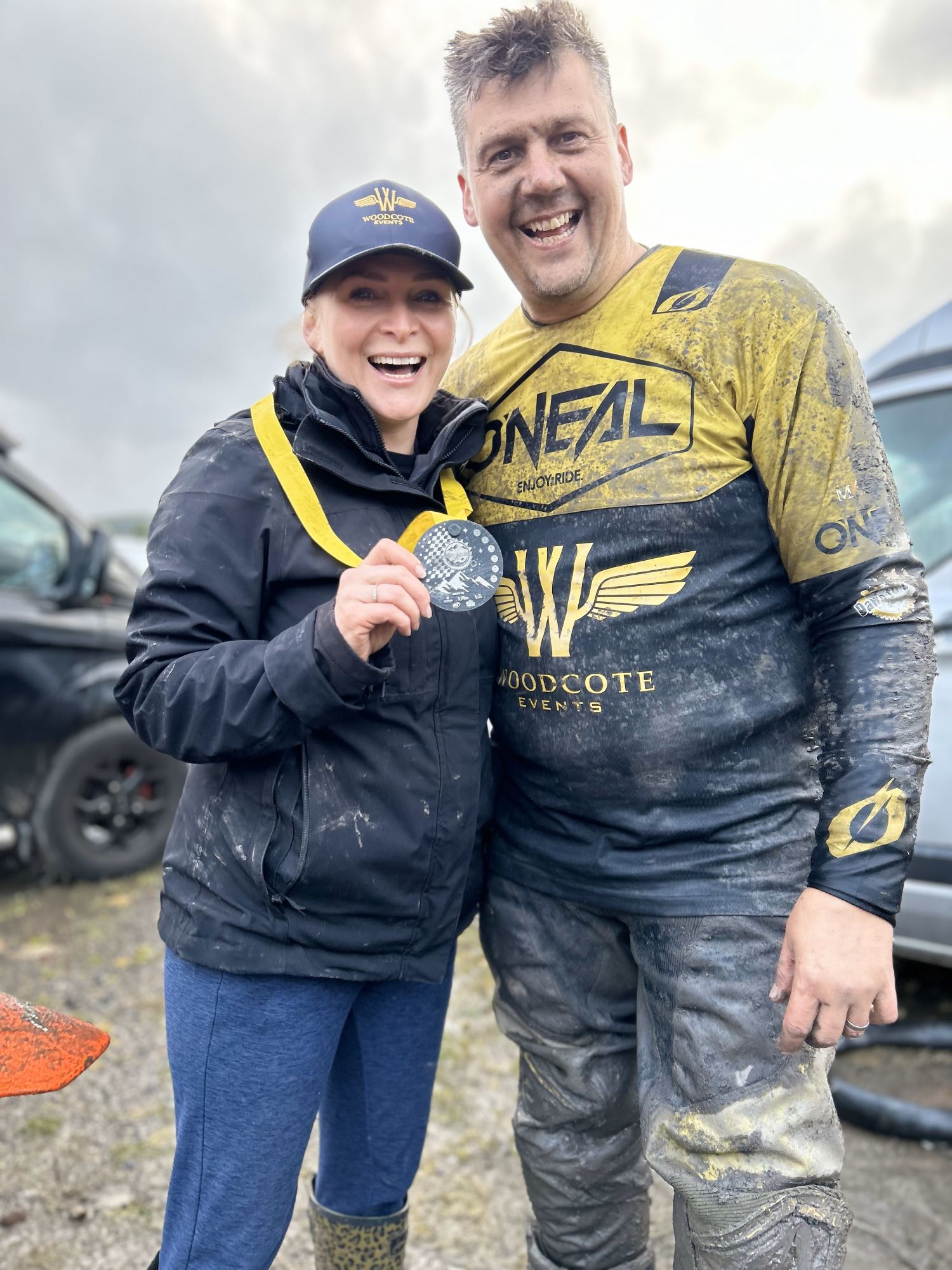 Jo Artherton & Gareth Bright with his race medal