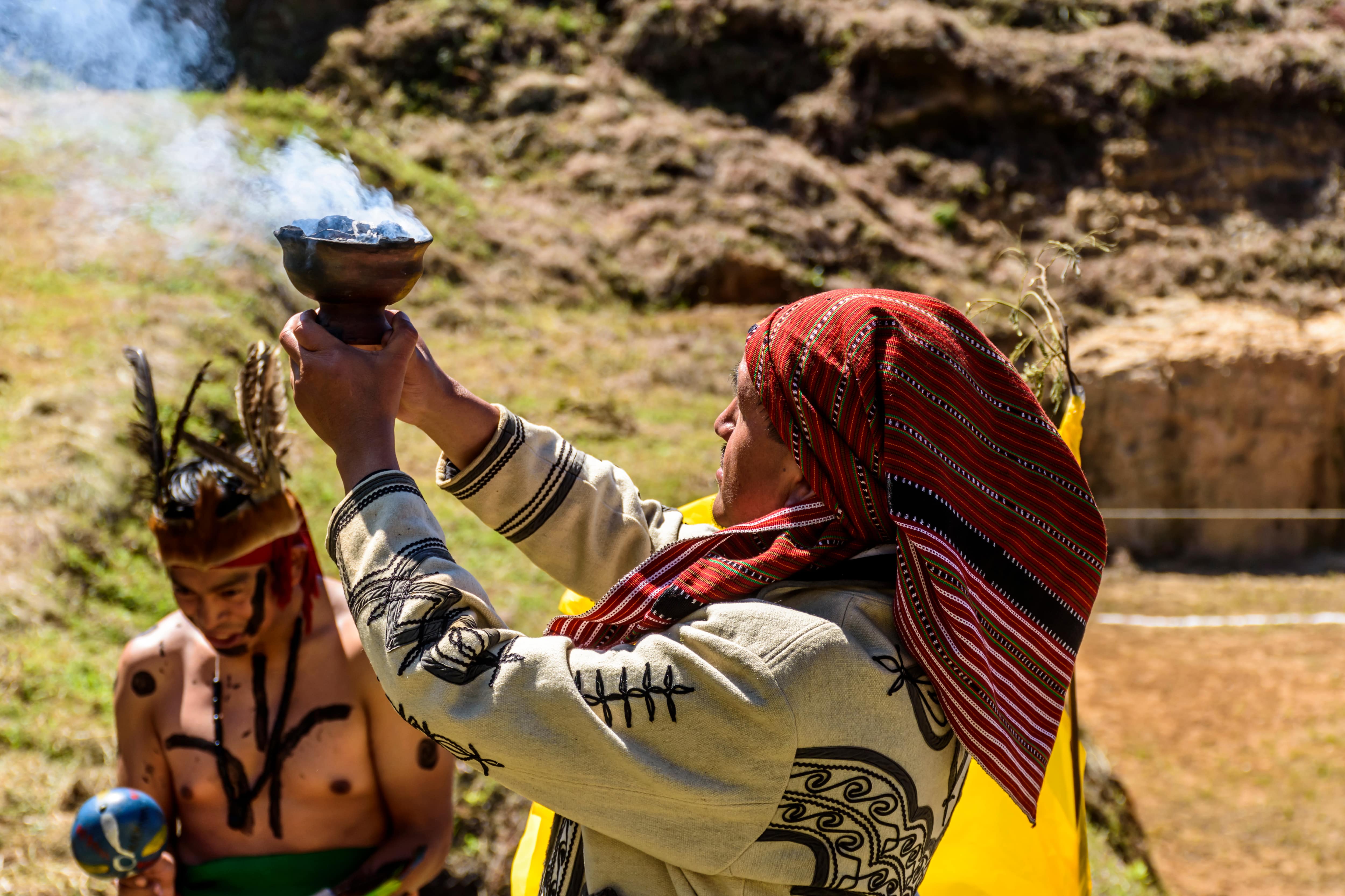 Maya shamen perform land blessing ceremony for new Maya ballgame court before a ballgame at Lake Atitlan in Guatemalan highlands.
