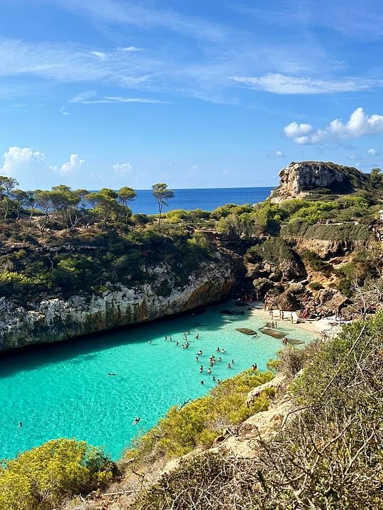 Things to do in Mallorca besides climbing: local food, culture, turquoise waters...