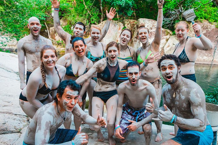 group of young people painted in mud costa rica all inclusive from toronto 