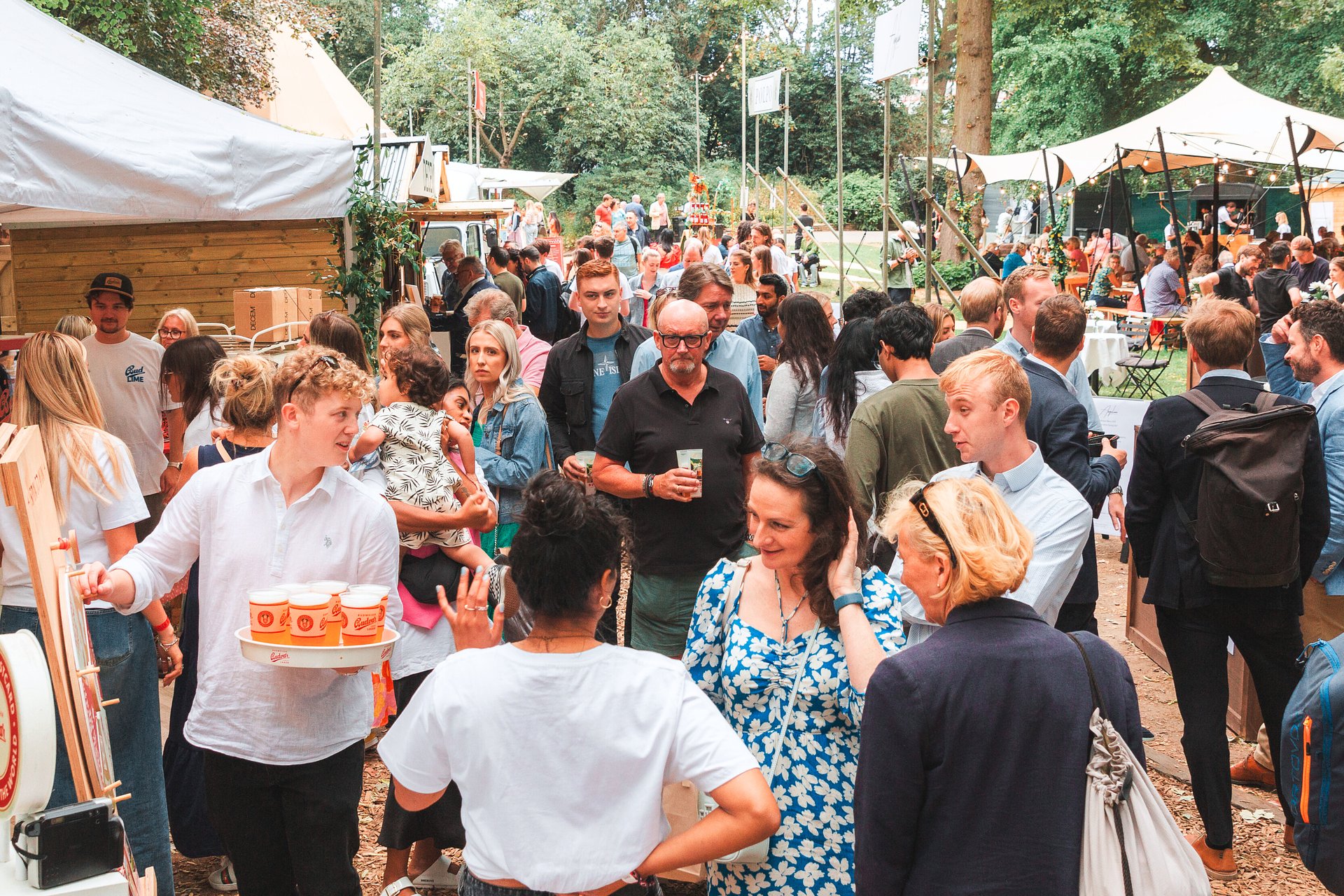 Vibrant crowd gathered near Budweiser beer stand to win some gifts at Savour Festival, Savour Festival - London’s ultimate culinary journey for foodie enthusiasts