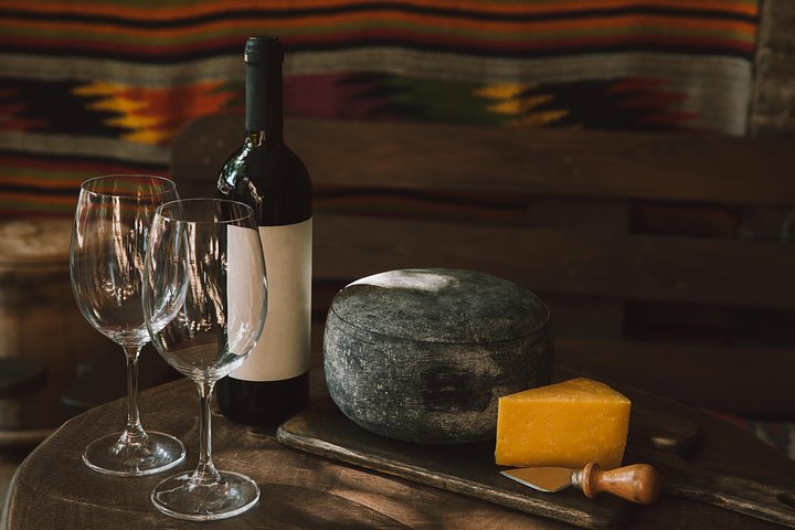 closeupshotofcheeseandwineonrusticwooden20241117174848utc1