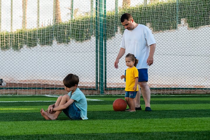 sadboysittingonlawnandfullbodymanwithlit20241205103100utc