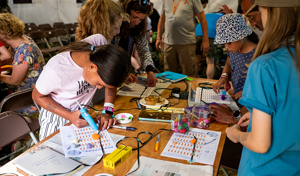 Children taking part in an astronomy workshop