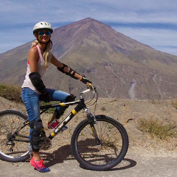 Female solo traveller mountain biking in Cusco_travel Peru