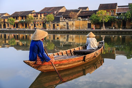 Visit Hoi An town, characterized by medieval streets with colorful painted houses