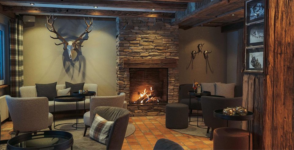 The Jagerbar with its fireplace at Hotel Jagerhof in Zermatt
