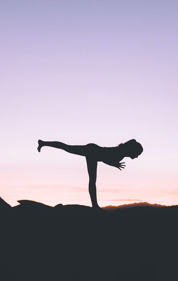 silhouettephotographyofwomanstandingonrightfootphotoFreeYogaImageonUnsplash