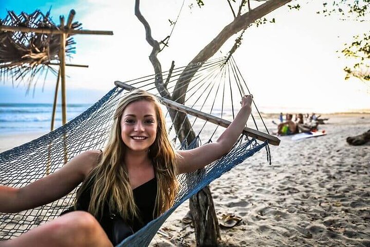 costa rica beach hammock girl smiling on a beach