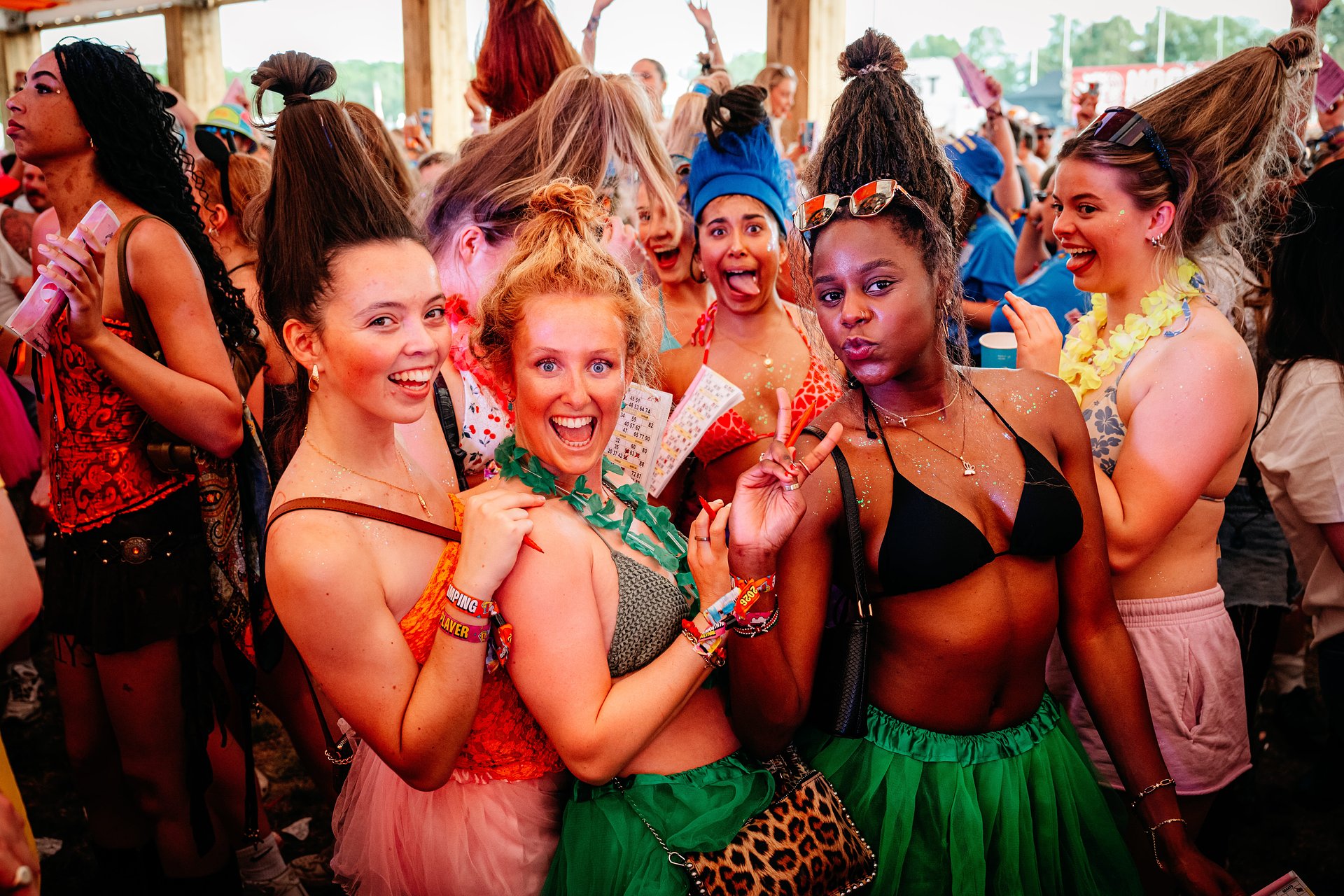 Girls dressed as Troll Dolls fancy dress costumes at Bournemouth 7s Festival in Dorset