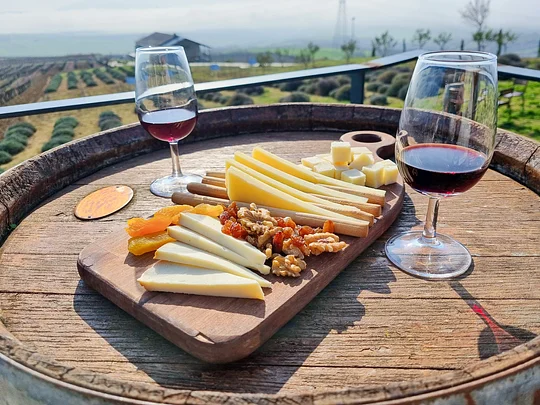 Sample local cheeses and volcanic wines, two specialties of the islands