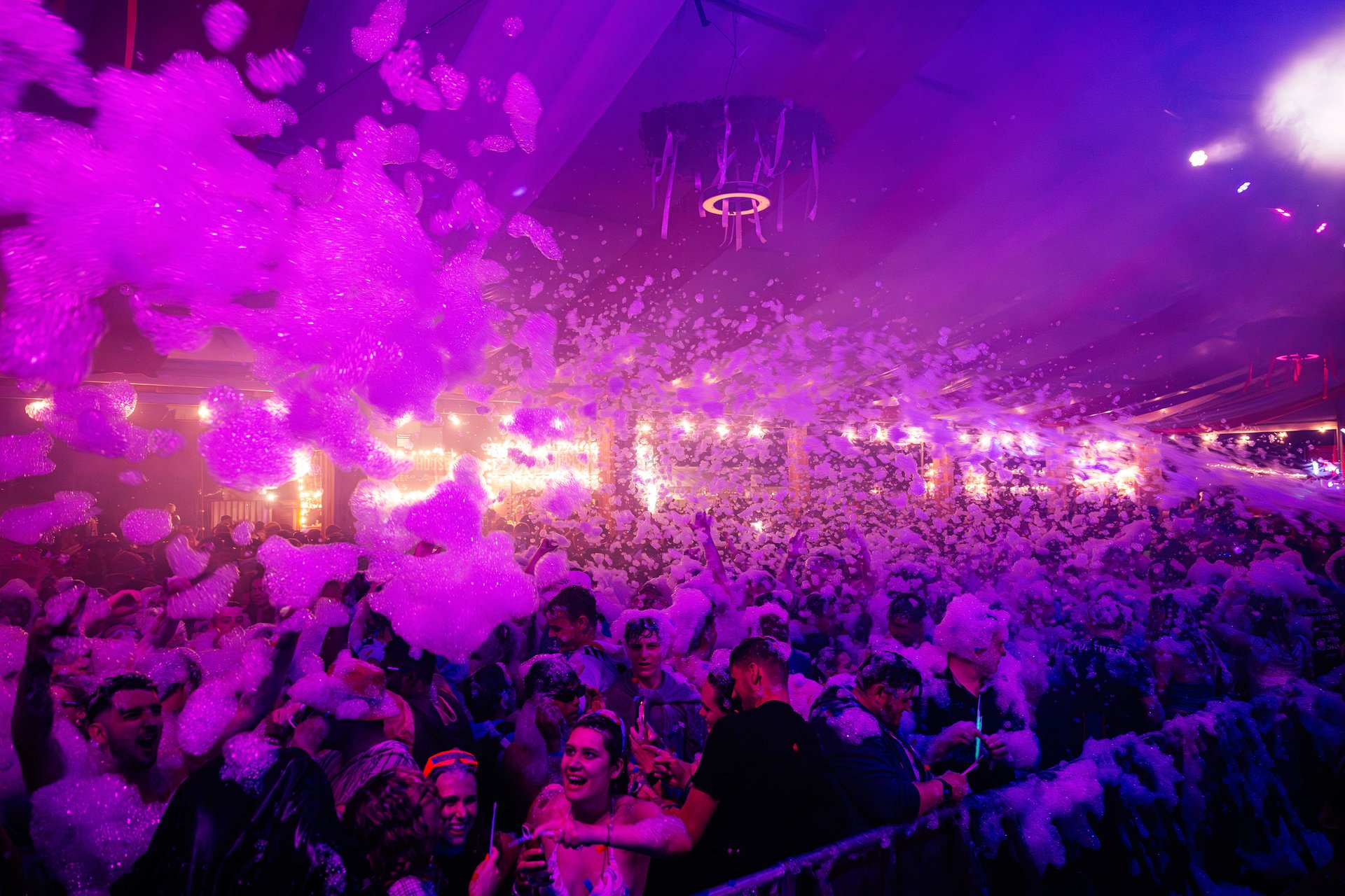 Large crowd shot in the Beer Tent during the foam party at Bournemouth 7s Festival in Dorset
