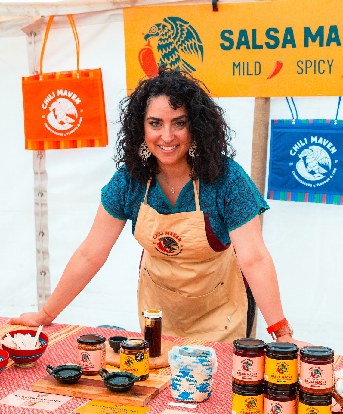 A artisan stand by and poca enjoying themselves at Savour London 
