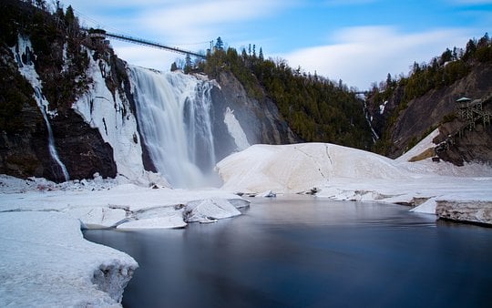 Visit Montmorency Falls and revel in its wintertime beauty