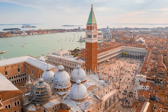 Visit St. Mark’s Basilica, the Doge’s Palace, and the Bridge of Sighs