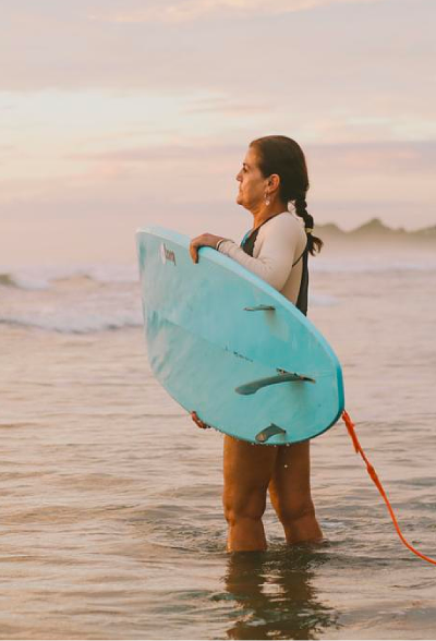 MindfulWaveswomansurftribesunsetwavesguionesnosara