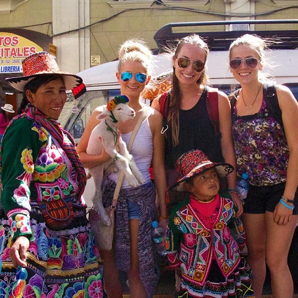 Female travellers chatting with locals in Arequipa Peru_travel Peru