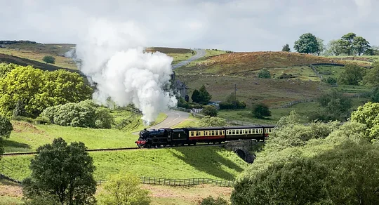 Sip wine and savor a 3-course lunch on a historic steam train