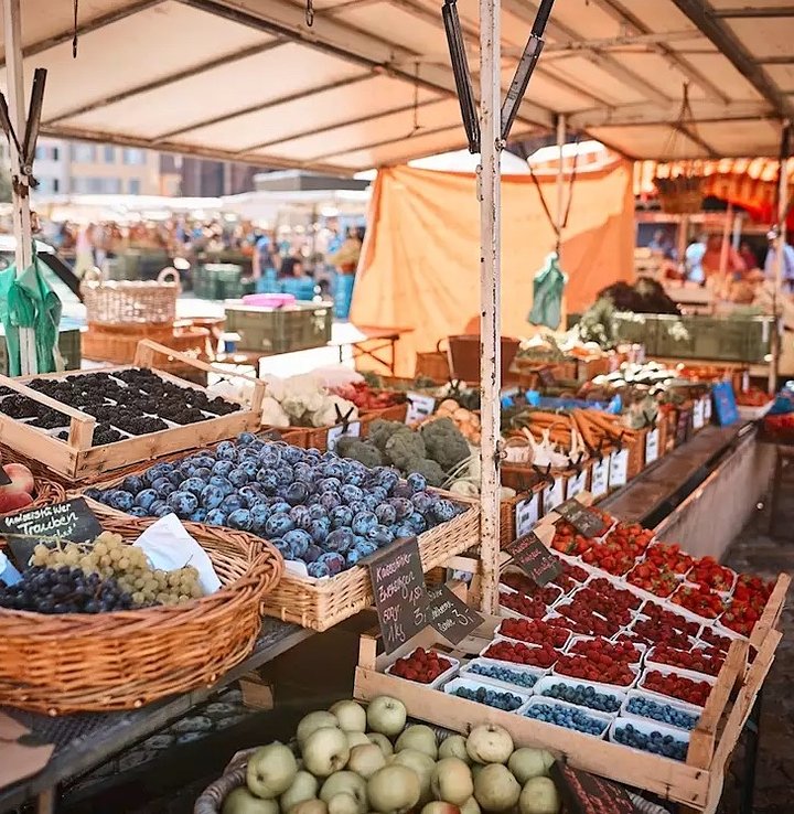 15988782farmersmarketfruitstandsfreiburgportraitjpeg