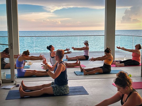 Daily Movement Classes Overlooking Sapodilla Bay