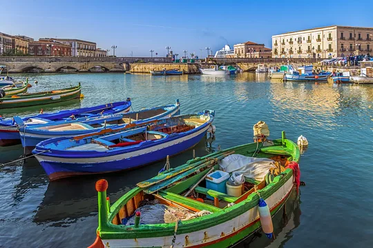 Soak in the sun on a private boat tour on the coast of Sicily