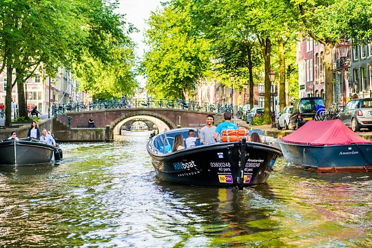 Take a private canal cruise in Amsterdam with a glass of bubbly