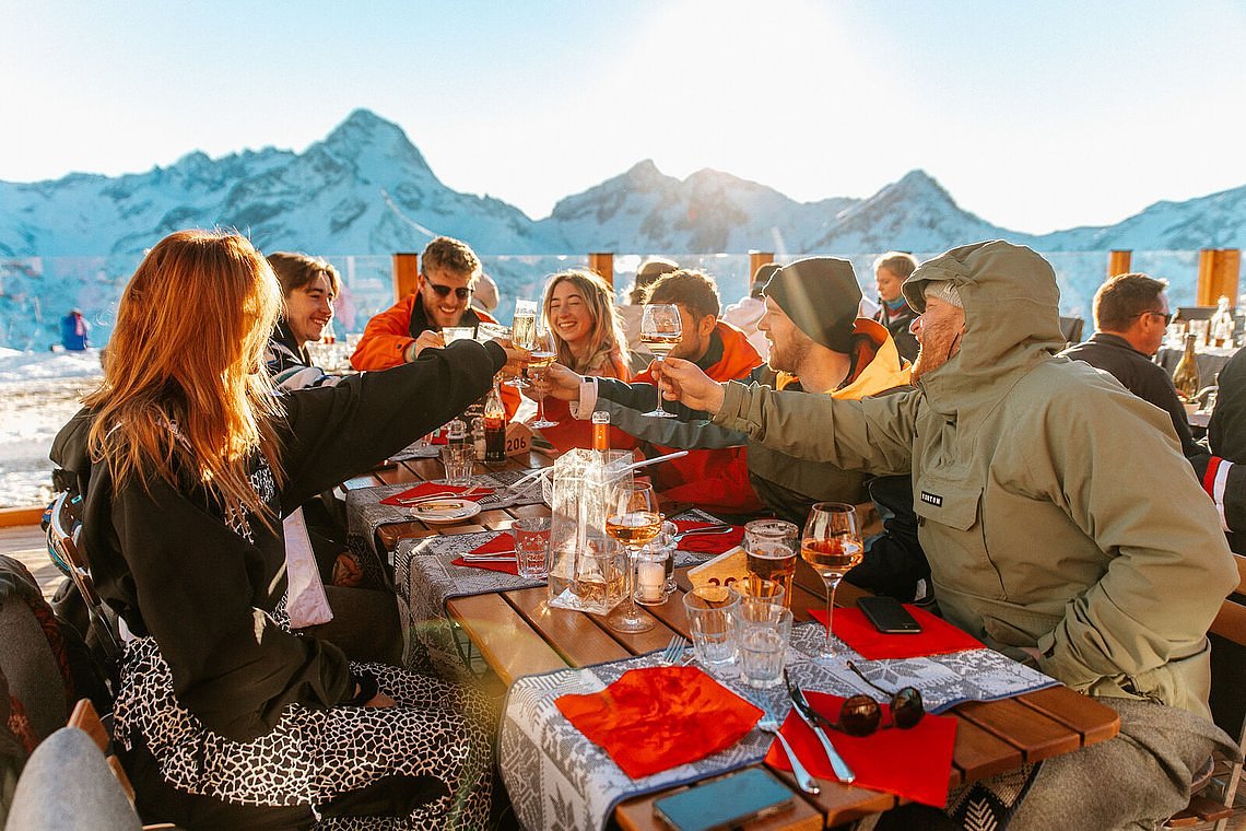 group of people enjoing dinner