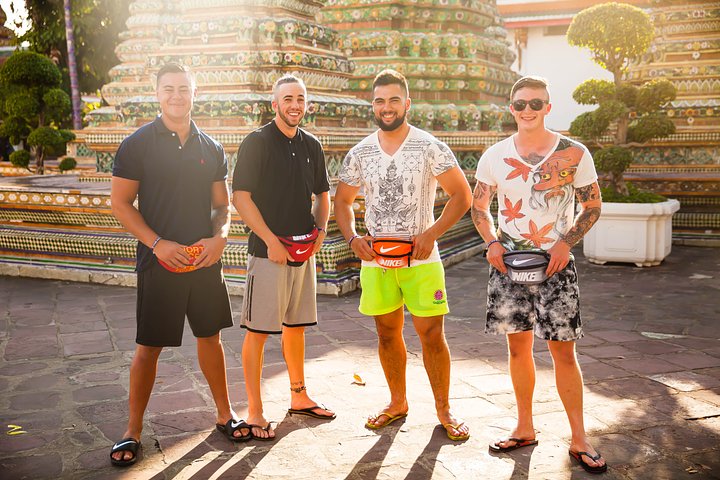 Wat po temple_male travellers with fanny packs