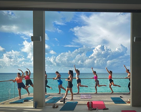 Daily Movement Classes Overlooking Sapodilla Bay