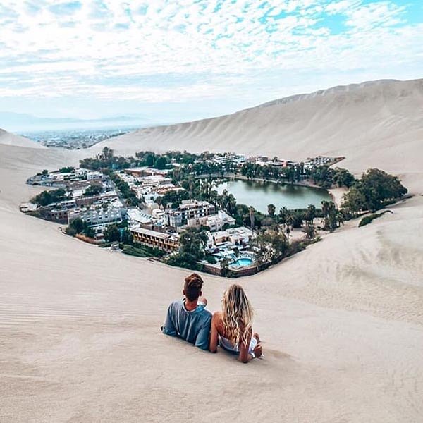 Couple looking at the sights of Huacachina Peru_peru tours