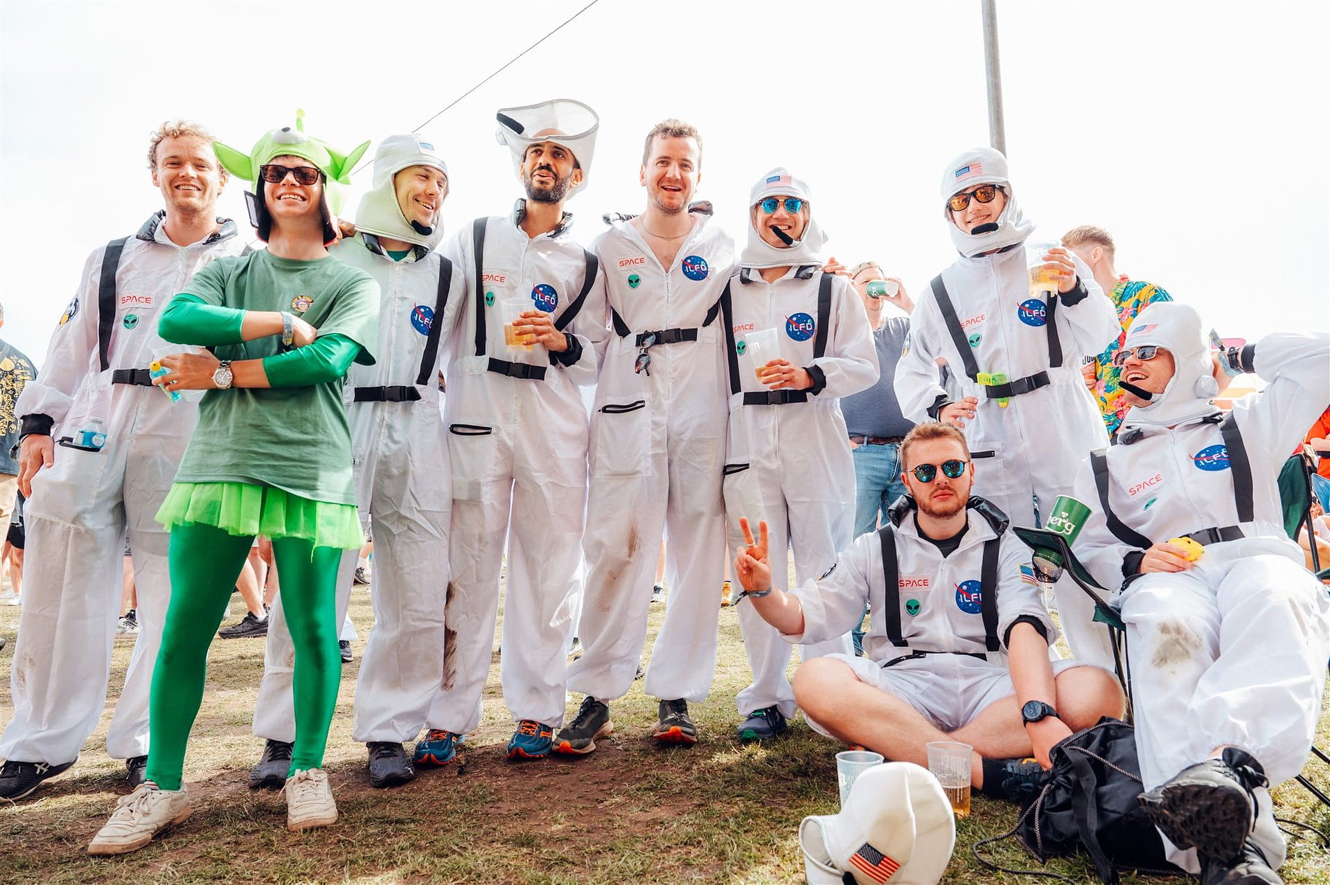 Rugby team dressed as astronauts and aliens fancy dress costumes at Bournemouth 7s Festival in Dorset