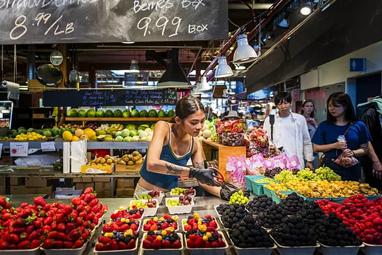 Stroll the vibrant stalls of the Granville Island Market on a food tour