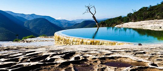 Join our extension and explore a frozen water fall with soaking pools