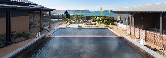 Stay in a modern onsen inn overlooking the Seto Sea