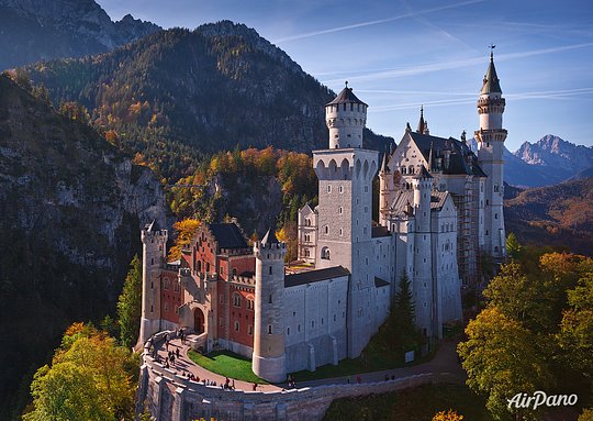 Visit the iconic Neuschwanstein castle in the foothills of the Alps 