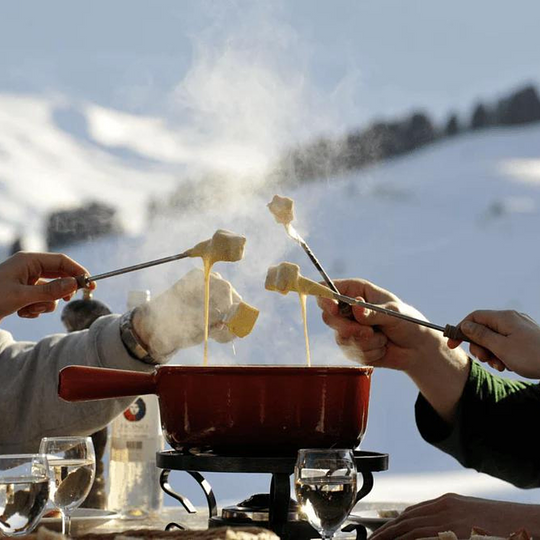 Fondue Over the Snow Peaked Mountains