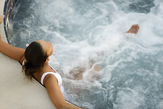 Soak in Banff's mountainside mineral hot spring pool